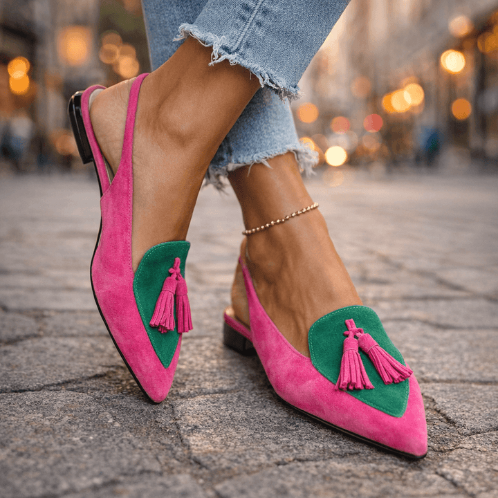 Pink suede tassel sandals with green and contrasting panel accents and ankle chain