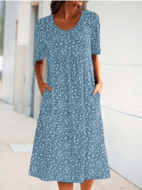 Light blue round-neck floral dress with short sleeves and midi length