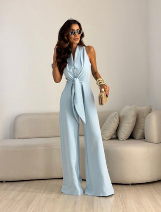 Sky blue sleeveless jumpsuit with wrap V-neck and tied waist, wide-leg