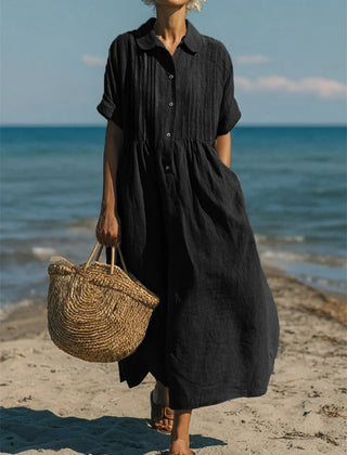 Black collared button dress with short sleeves and gathered waist