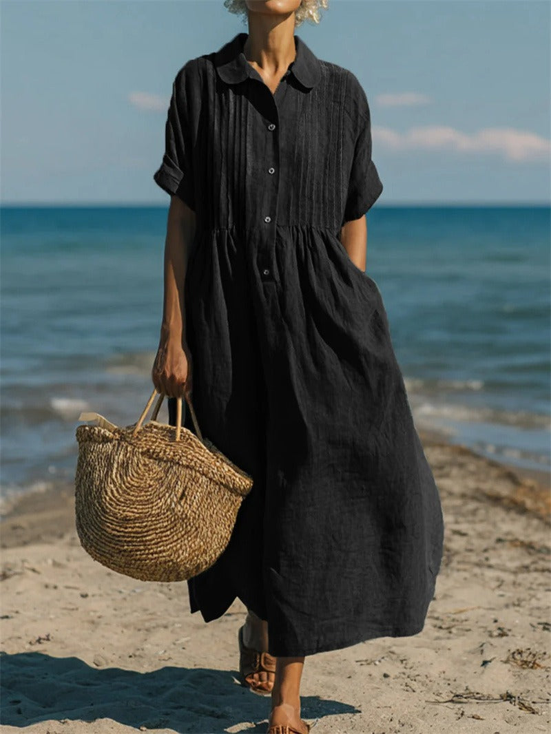 Black collared button dress with short sleeves and gathered waist