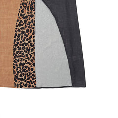 Leopard patchwork fabric detail on maxi dress with dark, tan, and cream panels
