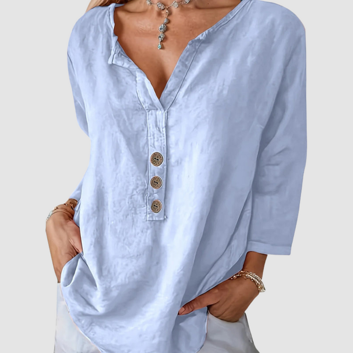 Light blue cotton-linen blouse, V-neck with three-button placket and three-quarter sleeves