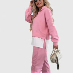 Pink hooded sweatshirt and jogger set with white layered hem