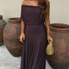 Dark plum off-shoulder ruched maxi dress with gathered waist and flowing hem