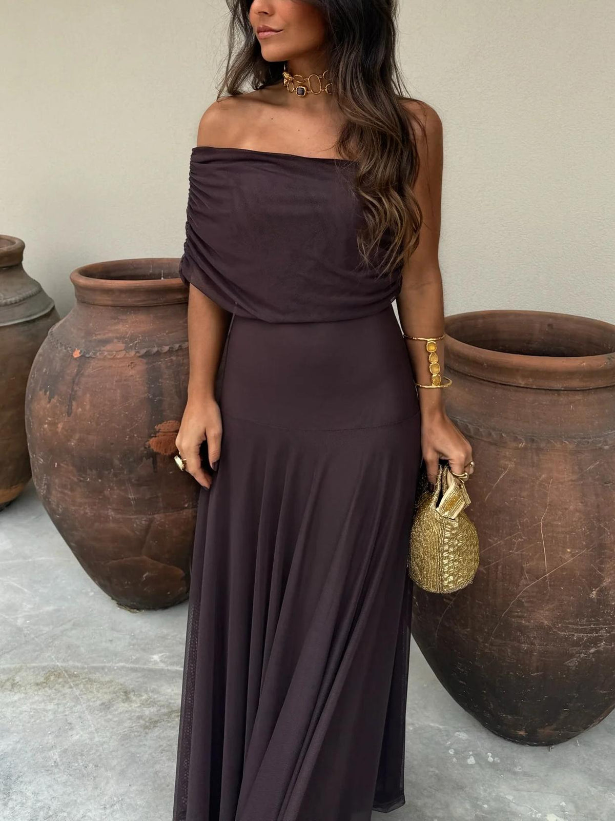 Dark plum off-shoulder ruched maxi dress with gathered waist and flowing hem