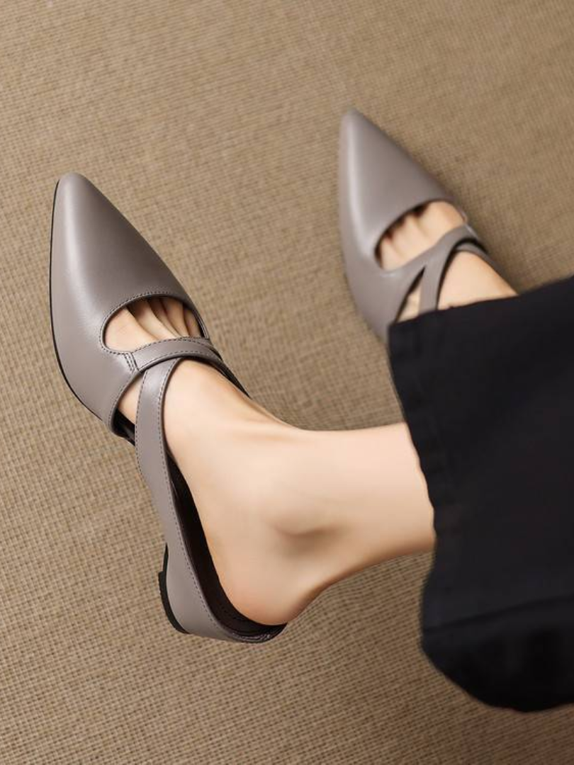 Gray pointed-toe mules with cross strap and low block heel