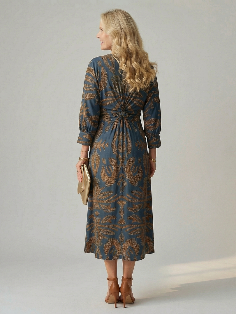 Natural wrap midi dress in dark blue with gold leaf pattern, 3/4 sleeves and waist tie
