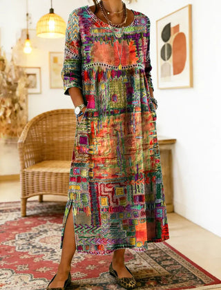 Warm red and green multicolor patchwork ethnic dress with 3/4 sleeves and round neckline