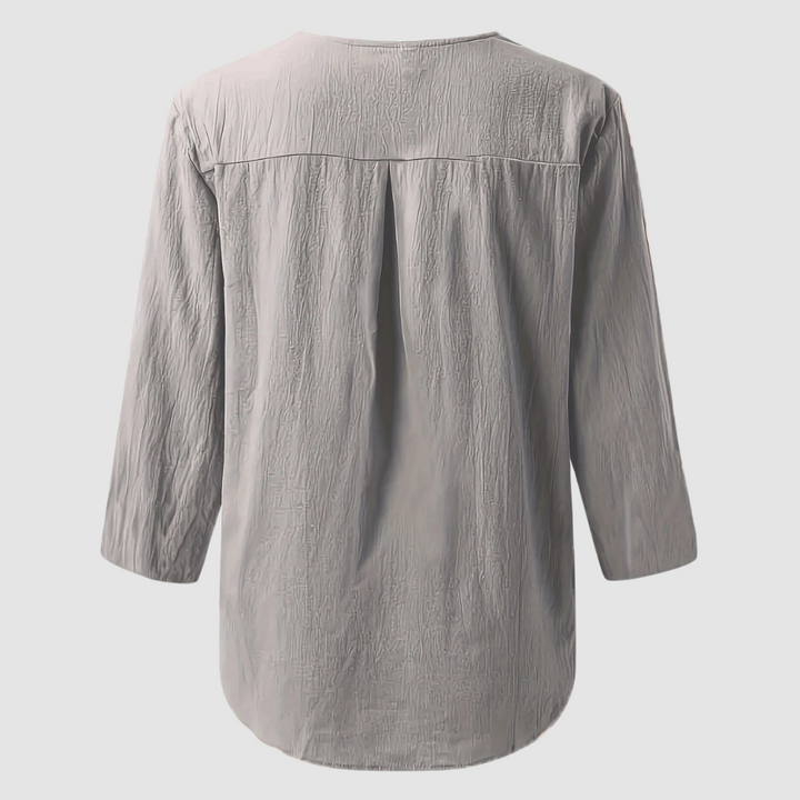 Light gray cotton-linen blouse, 3/4 sleeves, rounded back yoke pleats