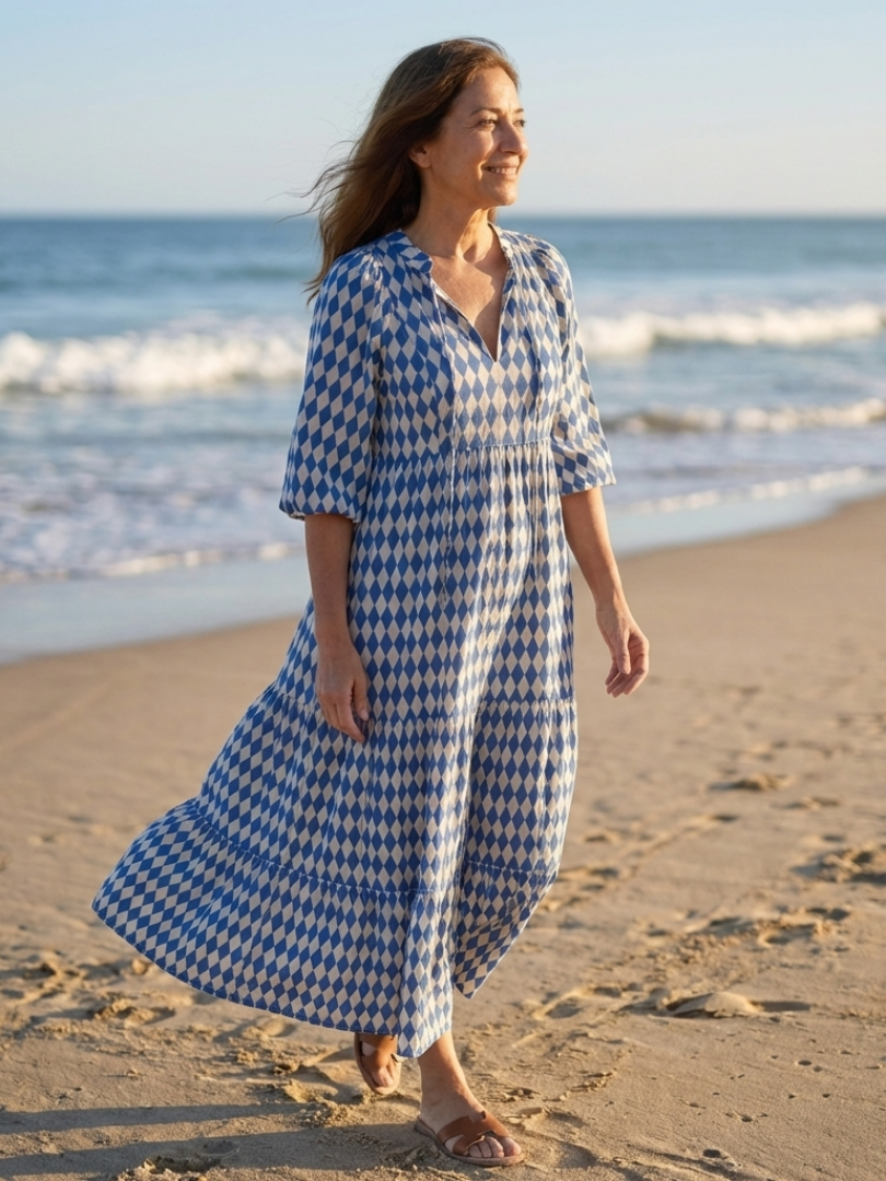 Sky blue diamond print tiered midi dress with V-neck and fluttering half sleeves