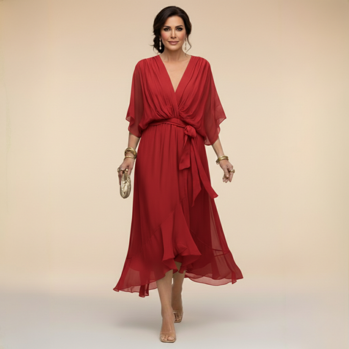 Red V-neck wrap dress with tied waist and lightweight chiffon midi skirt