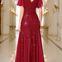Red sequin satin dress, V-back neckline, flutter sleeves, fitted waist, flared skirt