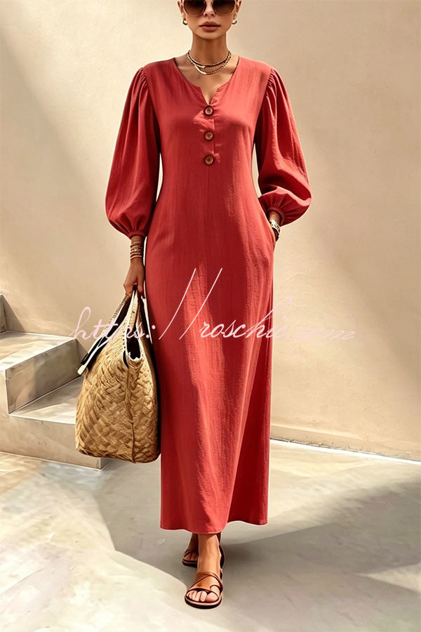 Red v-neck maxi dress with button front and lantern sleeves