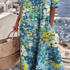 Floral print midi dress with short sleeves and gathered waist detail