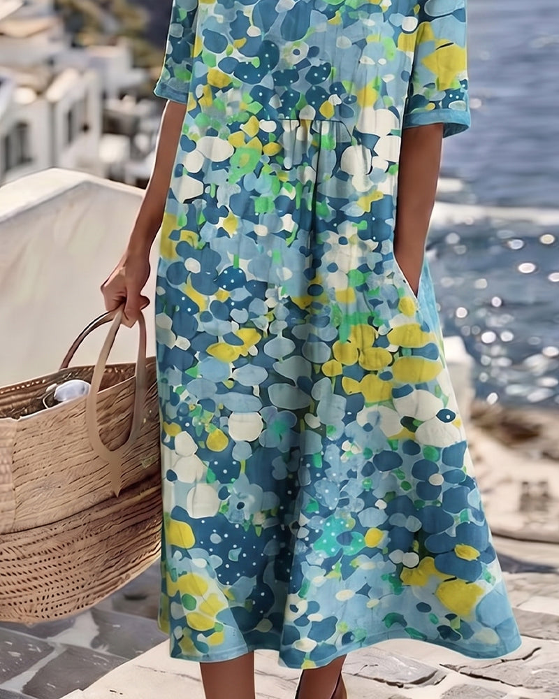 Floral print midi dress with short sleeves and gathered waist detail