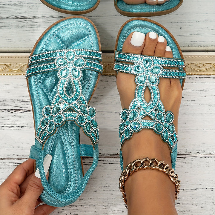 Teal orthopedic boho sandals with turquoise rhinestone bow and textured toe strap