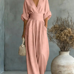 Women’s wide-leg jumpsuit in blush pink with V-neck and gathered waist