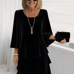 Black ruffle tiered dress with flared sleeves and square neckline