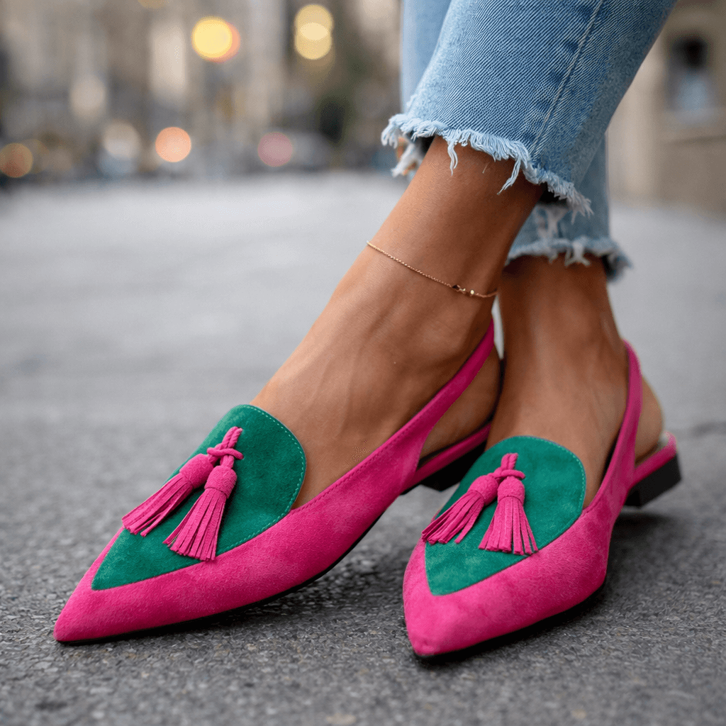 Pink suede tassel sandals with green panel accents and ankle chain detail