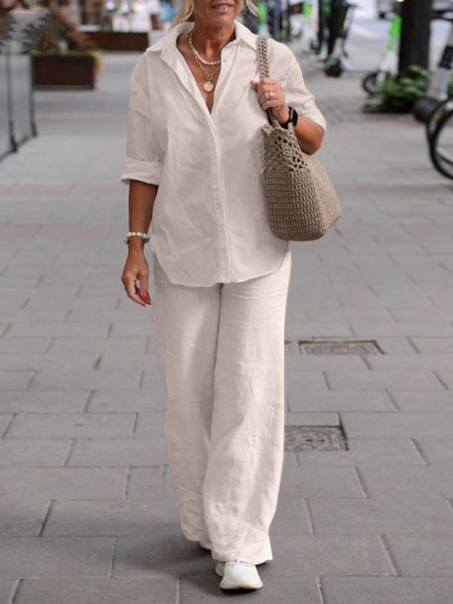 Cream two-piece set with short-sleeve button-up shirt and wide-leg pants