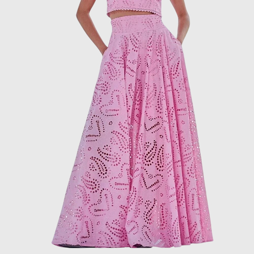 Pink lace midi skirt with scalloped eyelet pattern and gathered tiered look