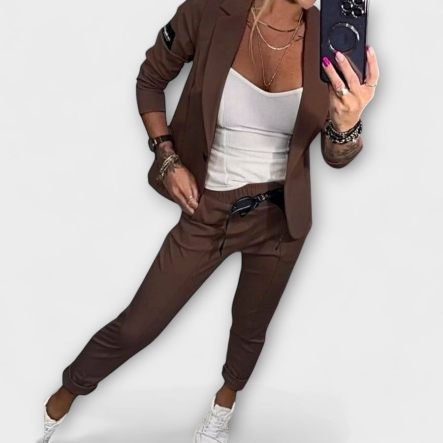 Brown blazer and pants set with white camisole top, tailored fit, 3/4 sleeves.