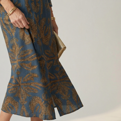 Natural wrap midi dress in dark blue with gold floral pattern