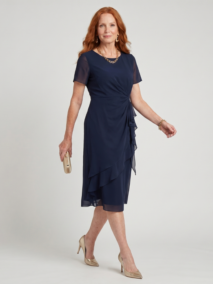 Navy midi dress with short sleeves and draped tiered ruffle skirt
