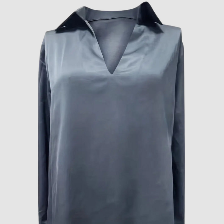 Gray-blue satin blouse with pointed collar and deep V-neck, long sleeves.