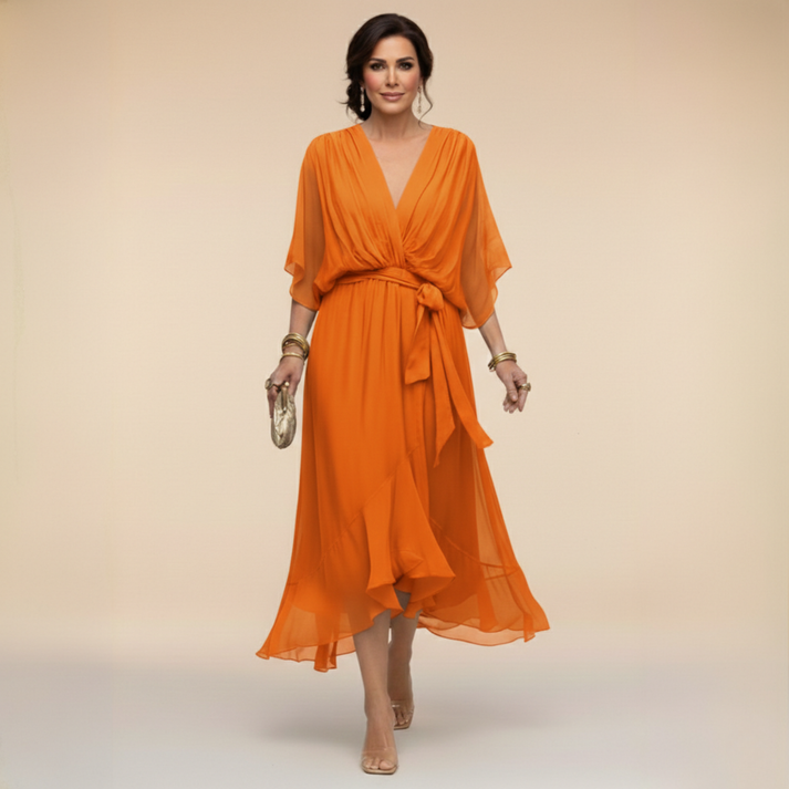 Orange V-neck wrap dress with tied waist and flowing chiffon midi hem