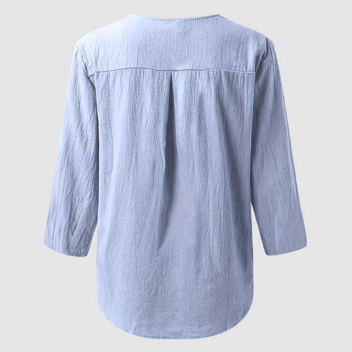 Melisa™ casual cotton-linen blouse, light blue back view with gathered yoke