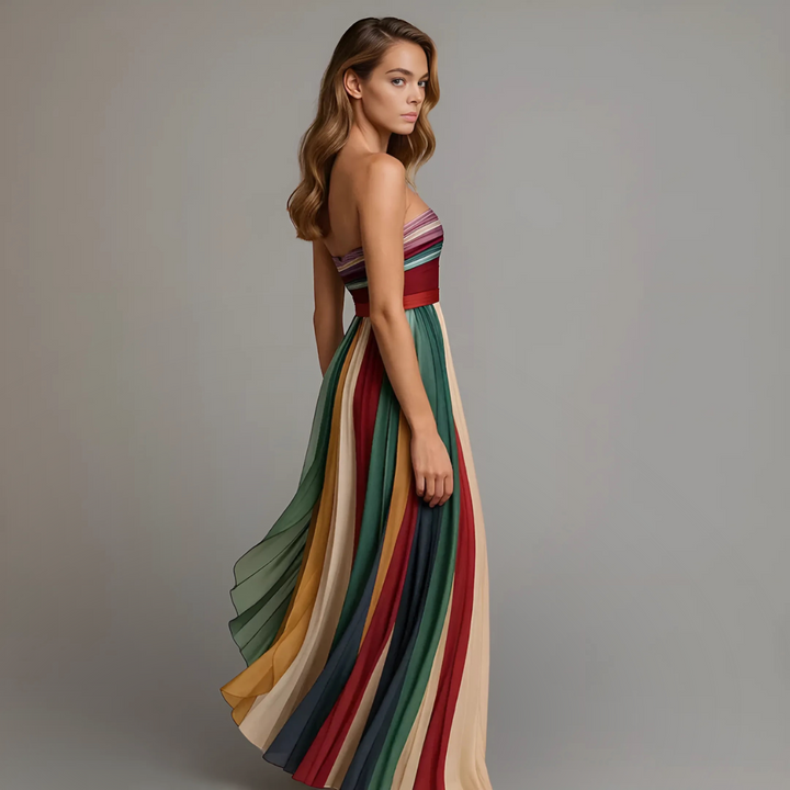 Strapless pleated maxi dress in multicolor vertical stripes, side view
