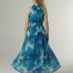 Blue tie-dye halter midi dress, back view with gathered neckline bow and smocked waist