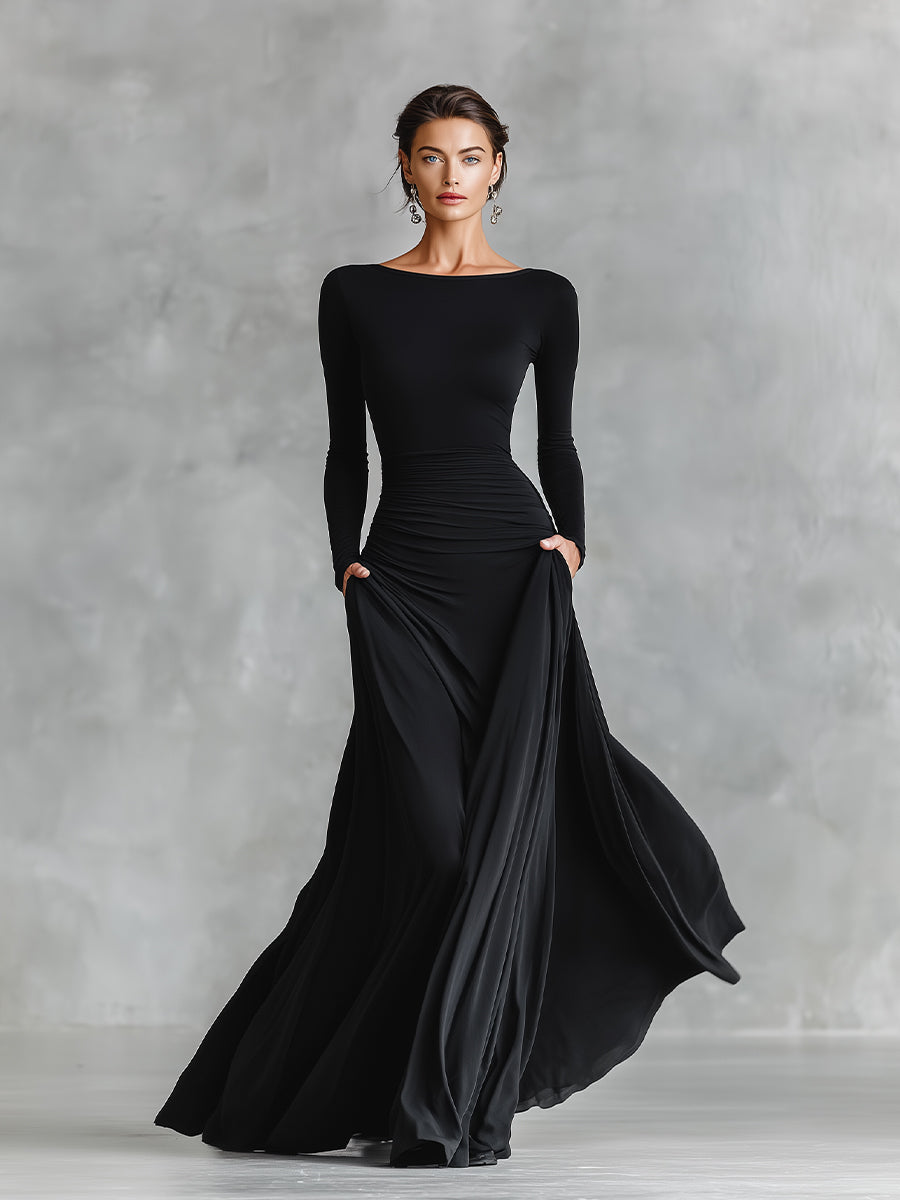 Black long-sleeve maxi dress with ruched waist and draped side skirt
