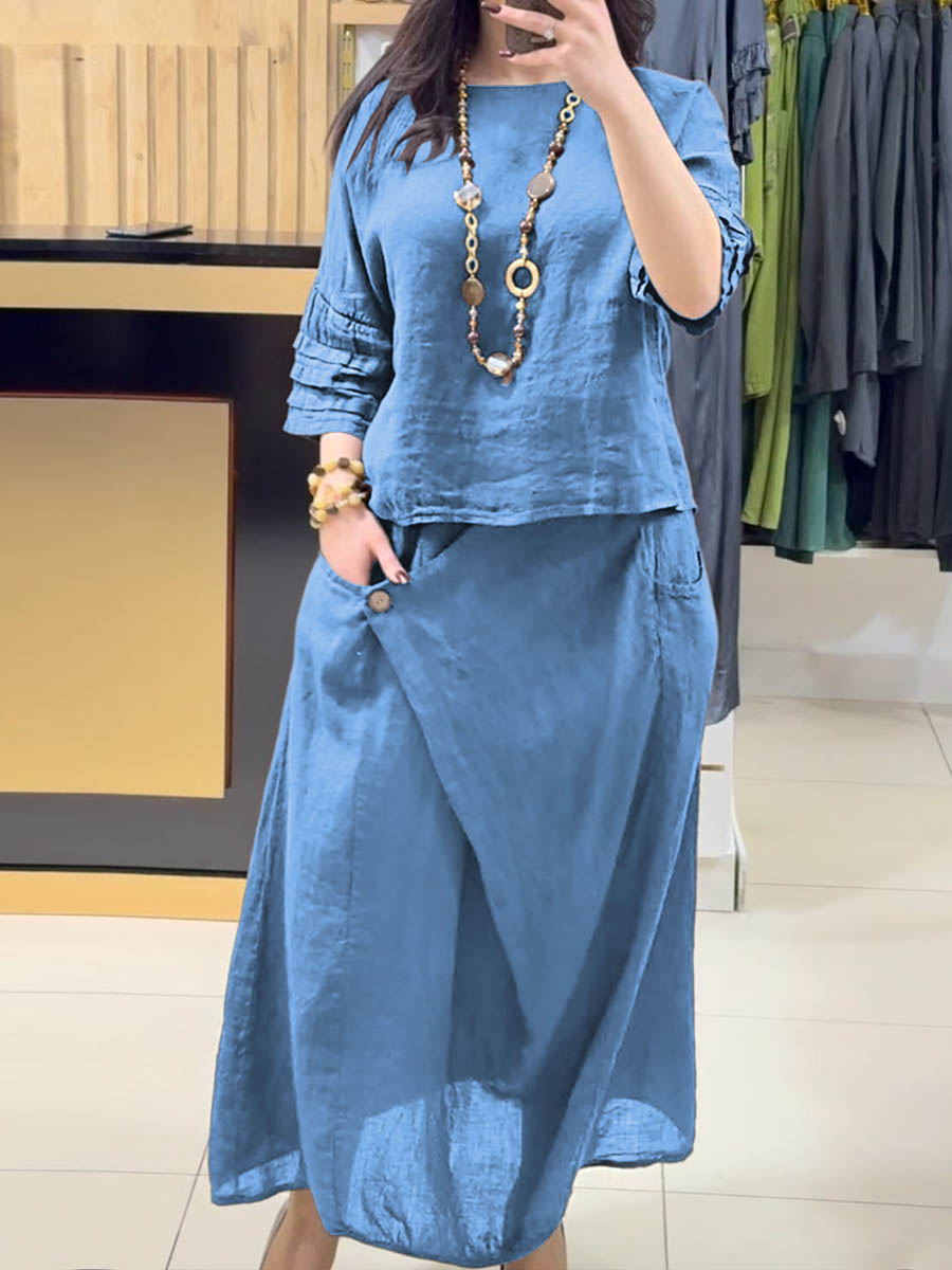 Blue two-piece outfit: long-sleeve tunic and gathered midi skirt with pockets