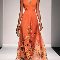Orange sleeveless V-neck floral dress with gathered waist and flowing midi skirt