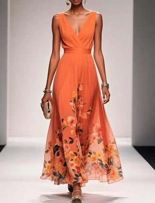 Orange sleeveless V-neck floral dress with gathered waist and flowing midi skirt