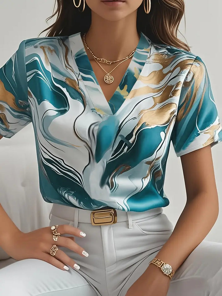 Marble print short-sleeve V-neck shirt in teal, blue, white, and cream