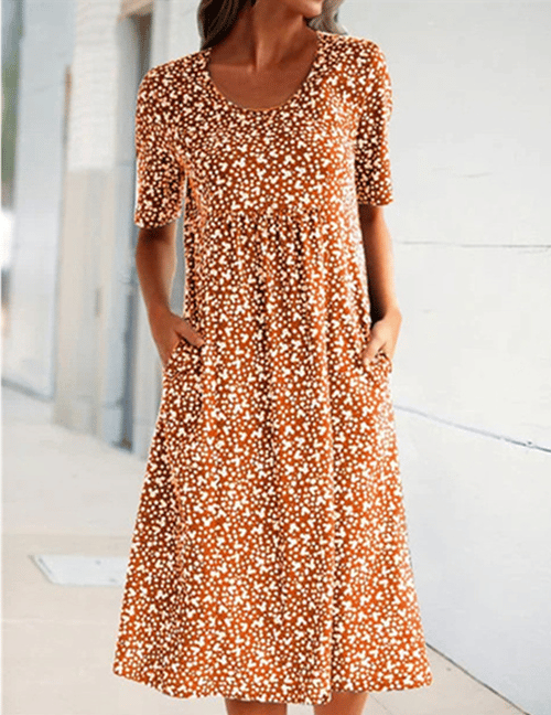 Orange round-neck floral dress with white speckle print and short sleeves