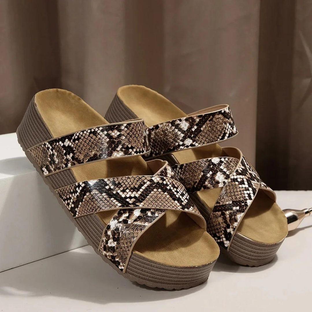 Snake print orthopedic leather wedge sandals with open-toe straps and braided detail