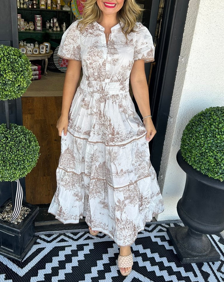 Tiered maxi dress with short sleeves and V-neck, white base with brown toile print