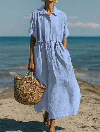 Light blue collared button dress with short sleeves and gathered waist
