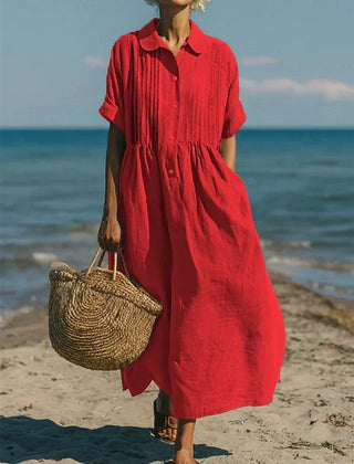 Red collared button dress with short sleeves and gathered waist