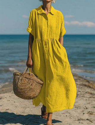 Yellow collared button dress with short sleeves and gathered waist