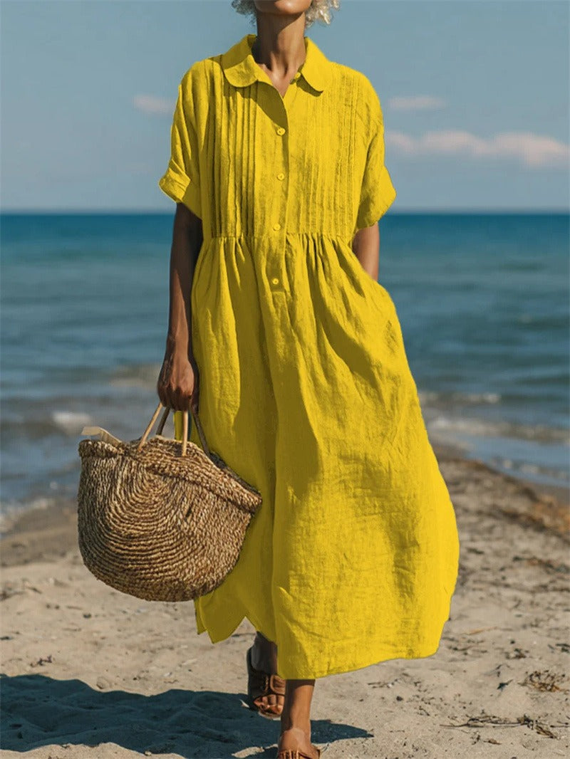 Yellow collared button dress with short sleeves and gathered waist
