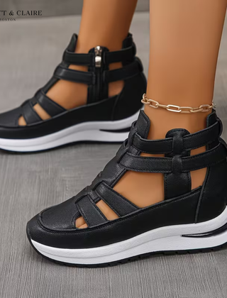 Black orthopedic comfort sandals with double adjustable straps, open toe, and cushioned sole