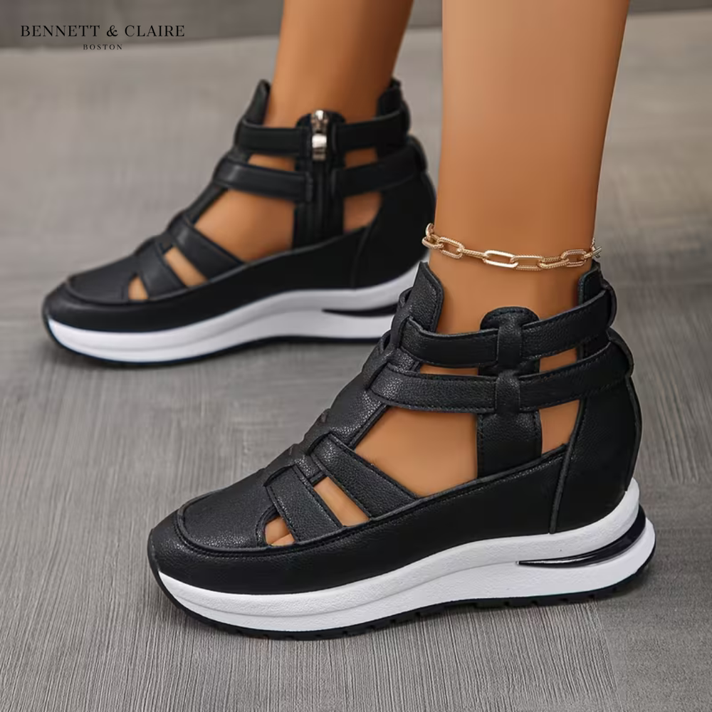 Black orthopedic comfort sandals with double adjustable straps, open toe, and cushioned sole