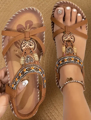 Boho comfort sandals in tan with decorative beadwork and charm tassel ankle straps