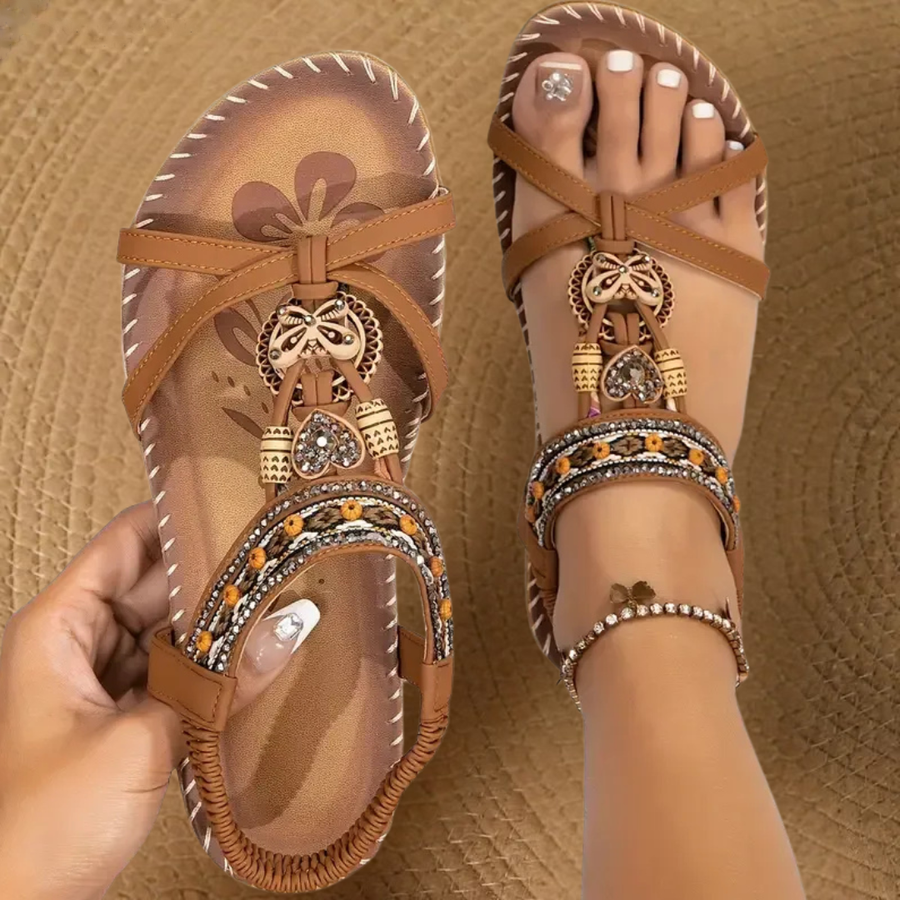 Boho comfort sandals in tan with decorative beadwork and charm tassel ankle straps